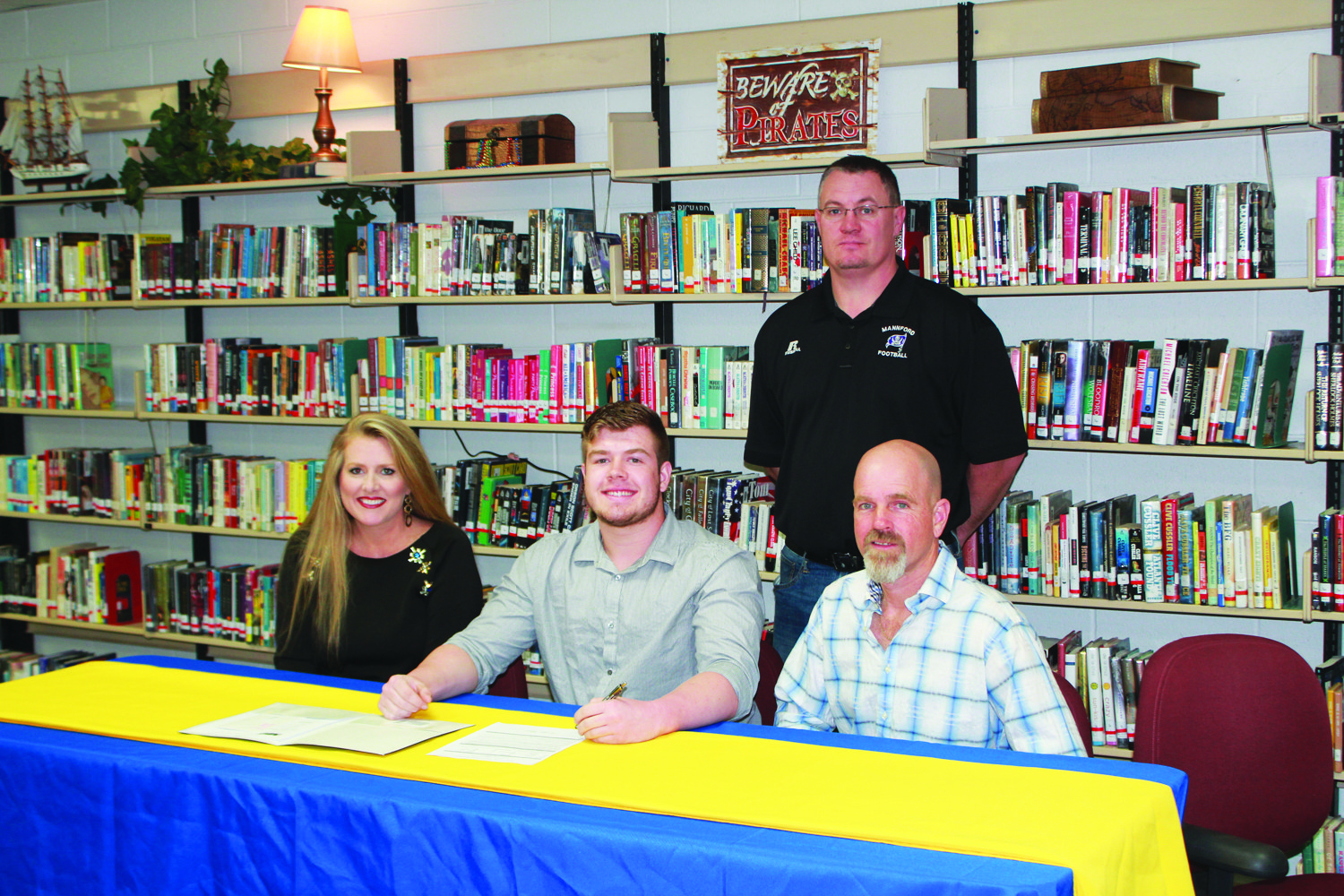 MHS senior Sullie Garner signs on for a full scholarship with NEO to play football next year.