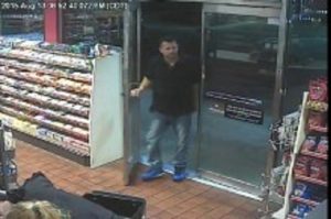 Suspect sought in stolen checks crime.