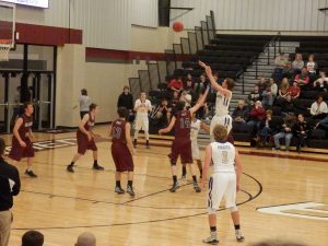 MHS Boys Basketball in Tournament action.